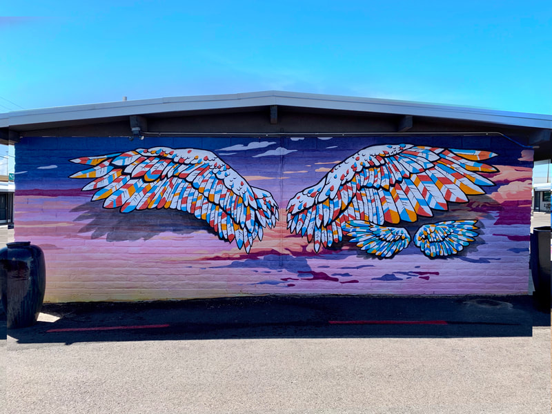 Wings mural by Ignacio Garcia